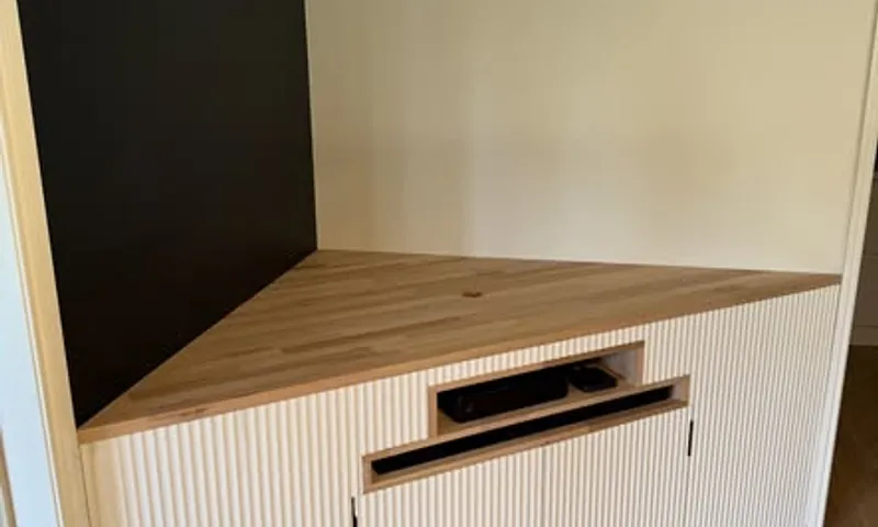 Built-in joinery unit with a fluted front