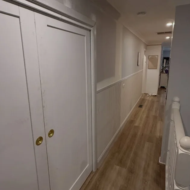 Hallway fit-out with panelling, cupboards and new trims
