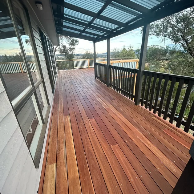 Hardwood deck under a verandah with a valley outlook