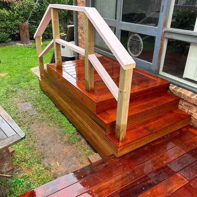 External hardwood stairs and handrail off a merbau deck